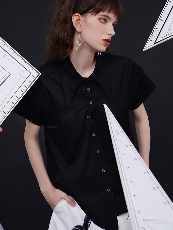 Geometric blouse with origami collar